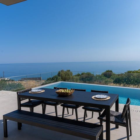 Gather on the terrace for Cretan feasts overlooking the Aegean
