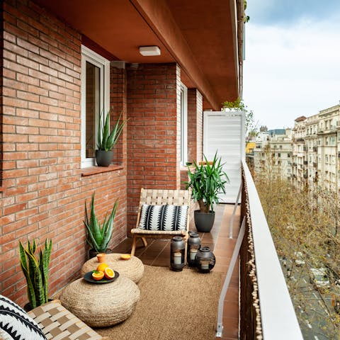End the day with a glass of chilled wine on the private balcony