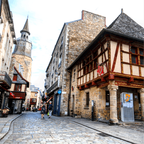 Wander charming cobbled streets past half-timber houses in the medieval town of Dinan – it's a thirty-minute drive away
