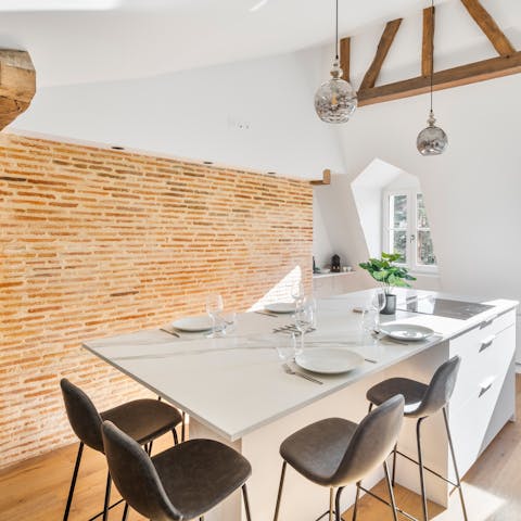 Share sociable soirées around the marble-topped kitchen island