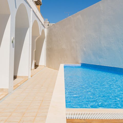 Enjoy a refreshing morning dip in the outdoor pool