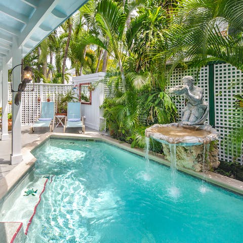 Chill poolside by the trickling water feature