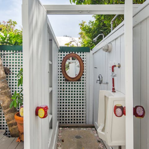 Rinse off under the morning sun in the outdoor shower