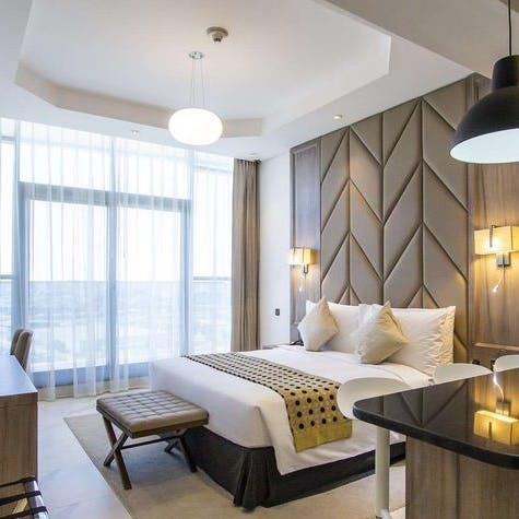 Wake up to sprawling city views from your bedroom