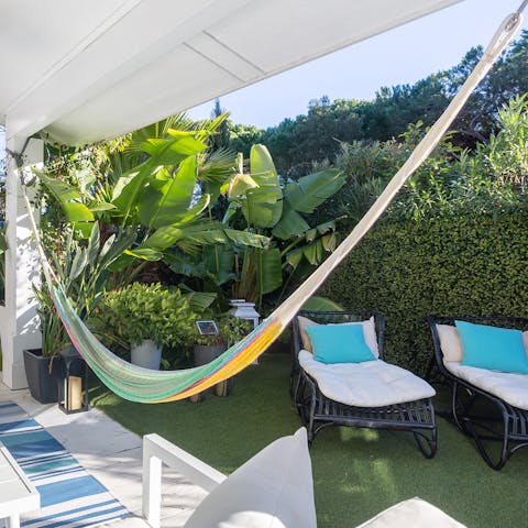 Settle into the hammocks or bag a lounger to while away the afternoon