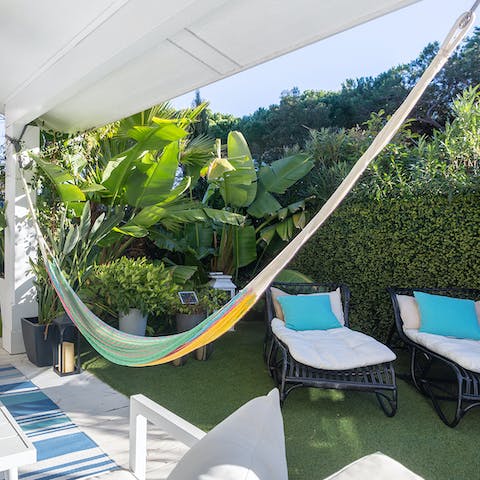 Settle into the hammocks or bag a lounger to while away the afternoon