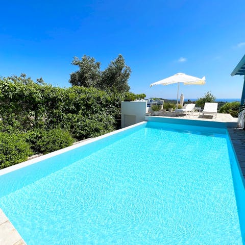 Lounge in the sun by the pool or jump right in for a refreshing swim 