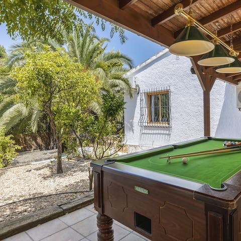 Play a game of pool, and escape the afternoon sun in the shaded casita 