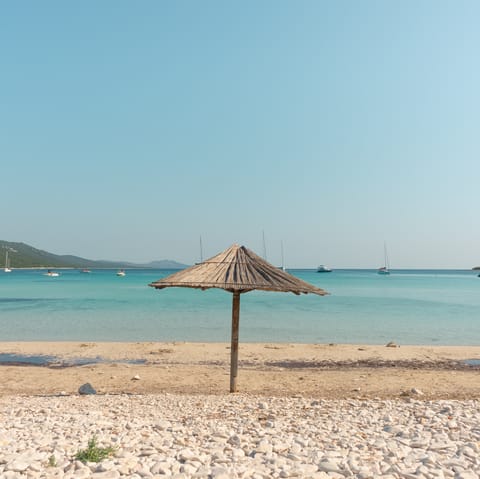 Let the sea wash over you at Fažana beach, just 700m away