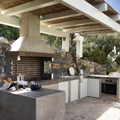 Take to the outdoor kitchen and whip up a Herculean feast for guests