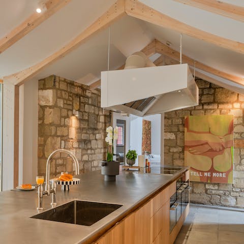 Linger over breakfast in this beautiful stone kitchen, where the natural light streams in each morning