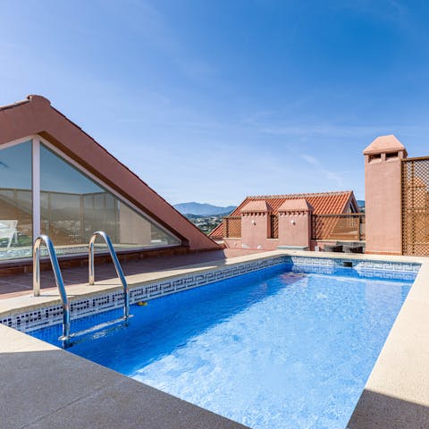 Hop in the private plunge pool, ideal for rooftop relaxation