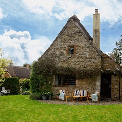 Admire the countryside vistas from the terrace as little ones run on the lawns