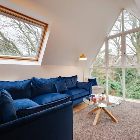 Get cosy on the sofa and enjoy the view overlooking the communal garden