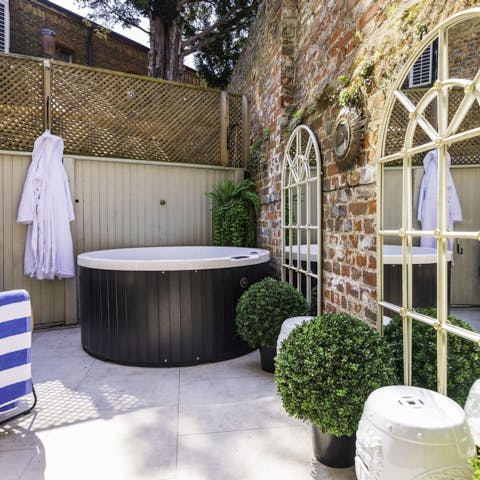 Treat yourself to long soaks in the hot tub with a glass of your favourite drink in hand