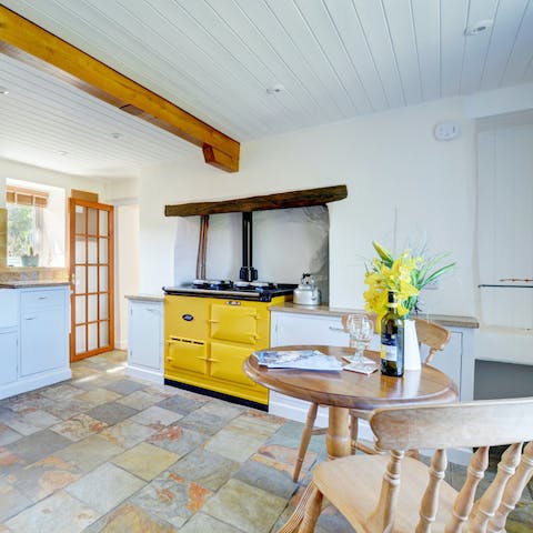 A cheerful yellow AGA will keep you cosy and brighten up your breakfast