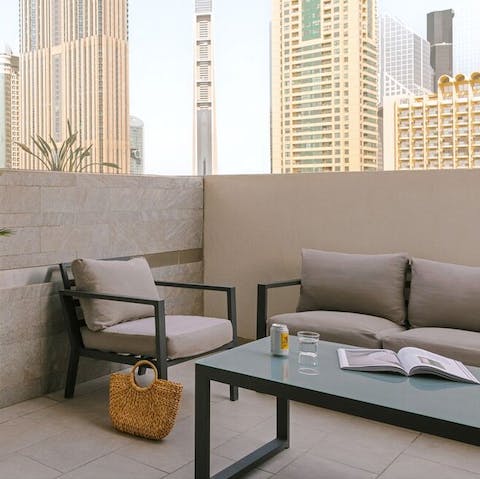 Enjoy your morning coffee on the private terrace while feasting on views of Downtown Dubai