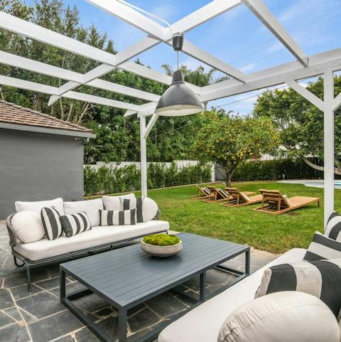 Enjoy the home's impressive outdoor lounge area on the terrace