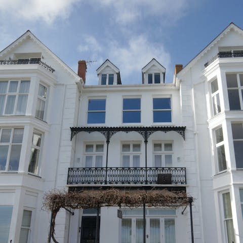 Stay in part of a stunning period building overlooking the entrance to the estuary and the sea