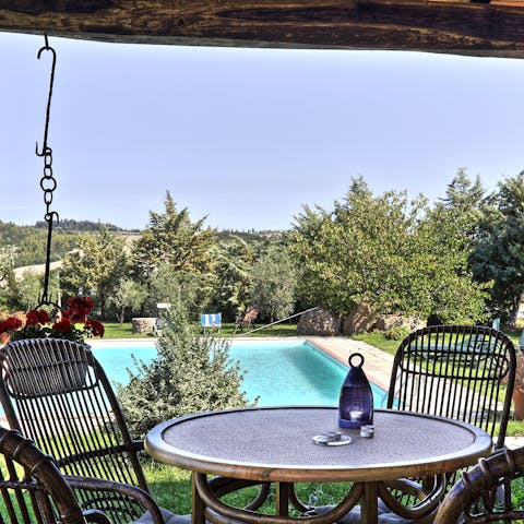 Sip on the wine from the vineyard on the outdoor table