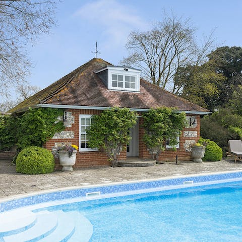 Pass sunny afternoons out in the heated swimming pool