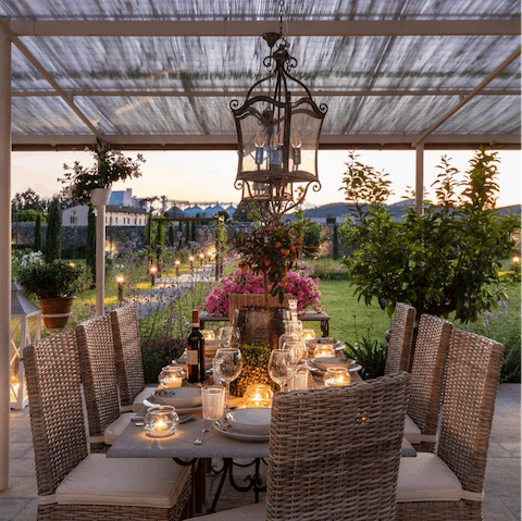 Dine alfresco with gorgeous views under the pergola 