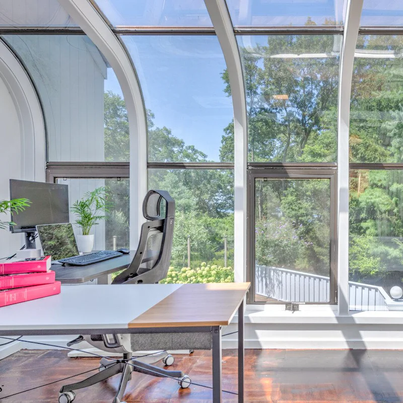 Find inspiration amidst the trees in the glass-encased study