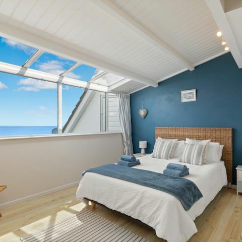 Wake up in the sunny bedroom with giant windows