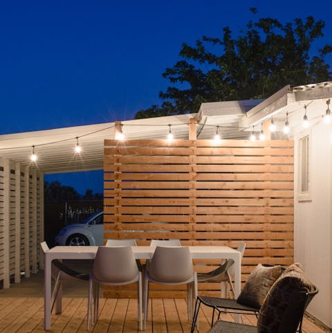 Dine under the stars on the wooden deck