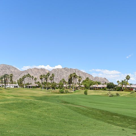 Views of the golf courses with mountains in the background