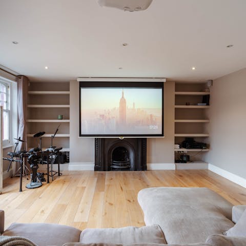 Immerse yourself in the cinema screen projector during your down time