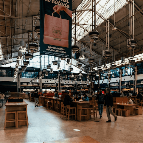 Experience a range of culinary delights at the Time Out Market, just six minutes away