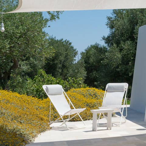 Relax under the shade on your private patio