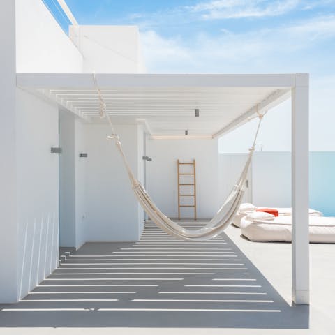 Snooze in the hammock when you need respite from the Santorini sun