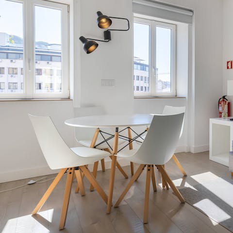 Catch up on work in the sun-filled dining area