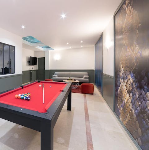 Play a game of pool, or unwind on the sofa with a glass of French wine