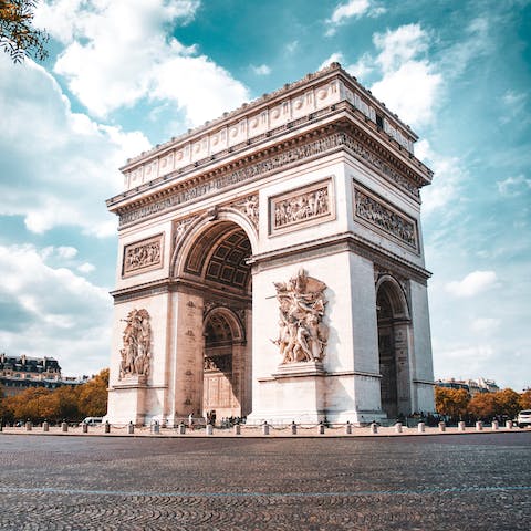 Visit the Arc de Triomphe, a four-minute walk from this home