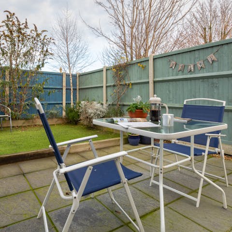 Fire up the barbecue and enjoy an alfresco dinner in the back garden