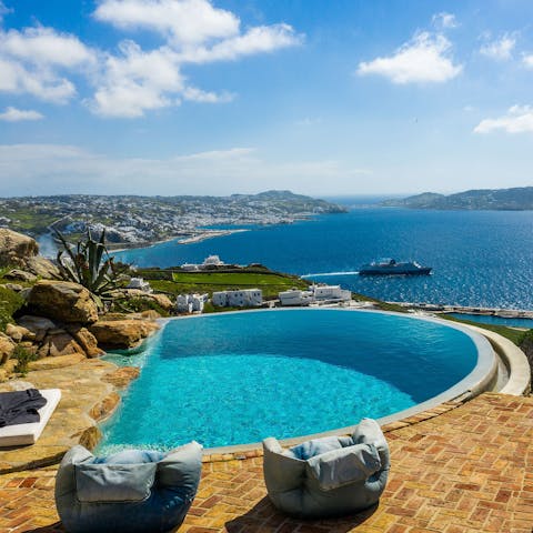 Soak in the sun by the pool with panoramic views