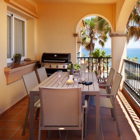 Soak up views of the Mediterranean Sea as you tuck into dinner on the terrace