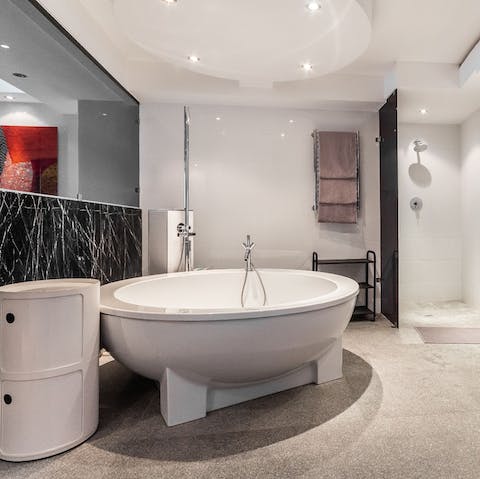 Treat yourself to an uninterrupted soak in the freestanding bathtub