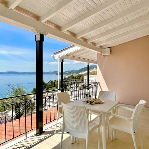 Take in stunning sea views from your private terrace while enjoying an alfresco meal