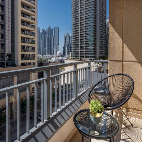 Savour your morning coffee on the balcony, letting the sun warm up your face while enjoying the city vista