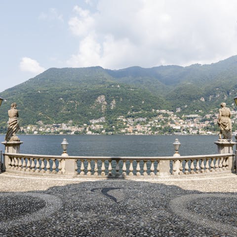 Stroll around the villa's beautiful grounds that sit directly on Lake Como