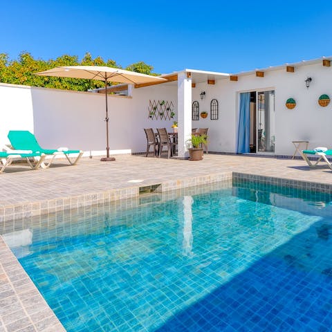 Alternate between the crystal-clear waters of the private pool and the sun loungers