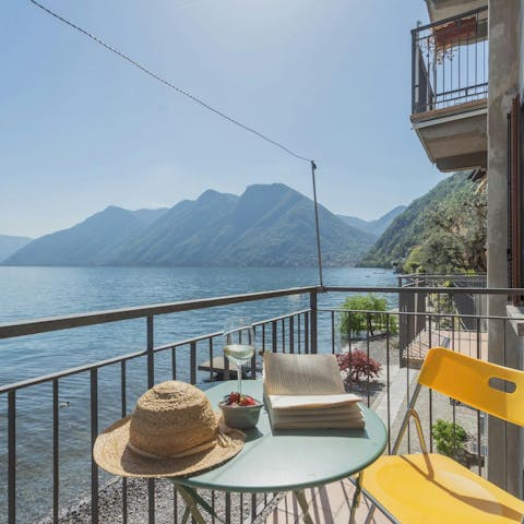 Sip a glass of Italian wine as you drink in the lake vistas