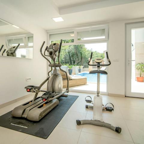Start your days with a quick session in the gym, overlooking the glittering pool area