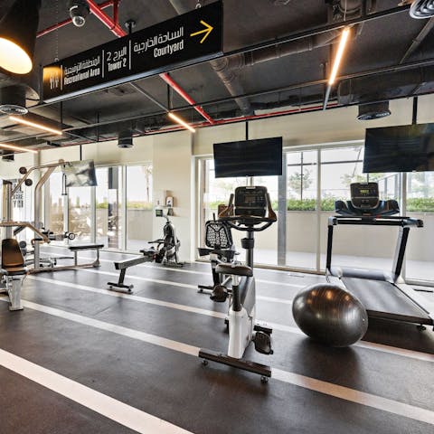 Keep on top of your workout routine in the building's shared gym