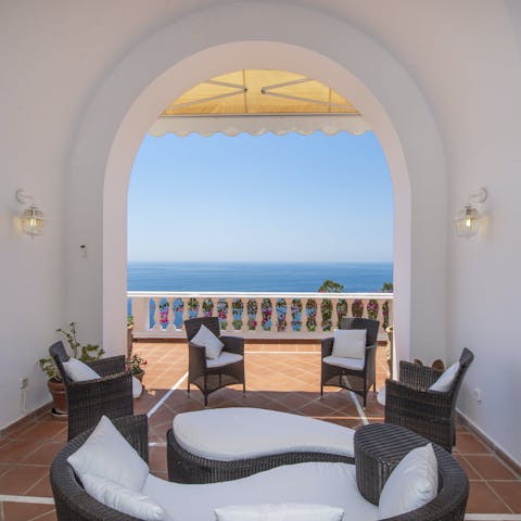 Enjoy sea views while you relax in the shade