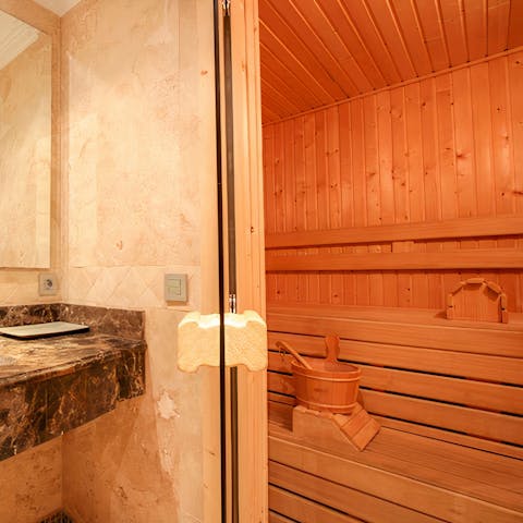 Relax with loved ones after a busy day in the private sauna